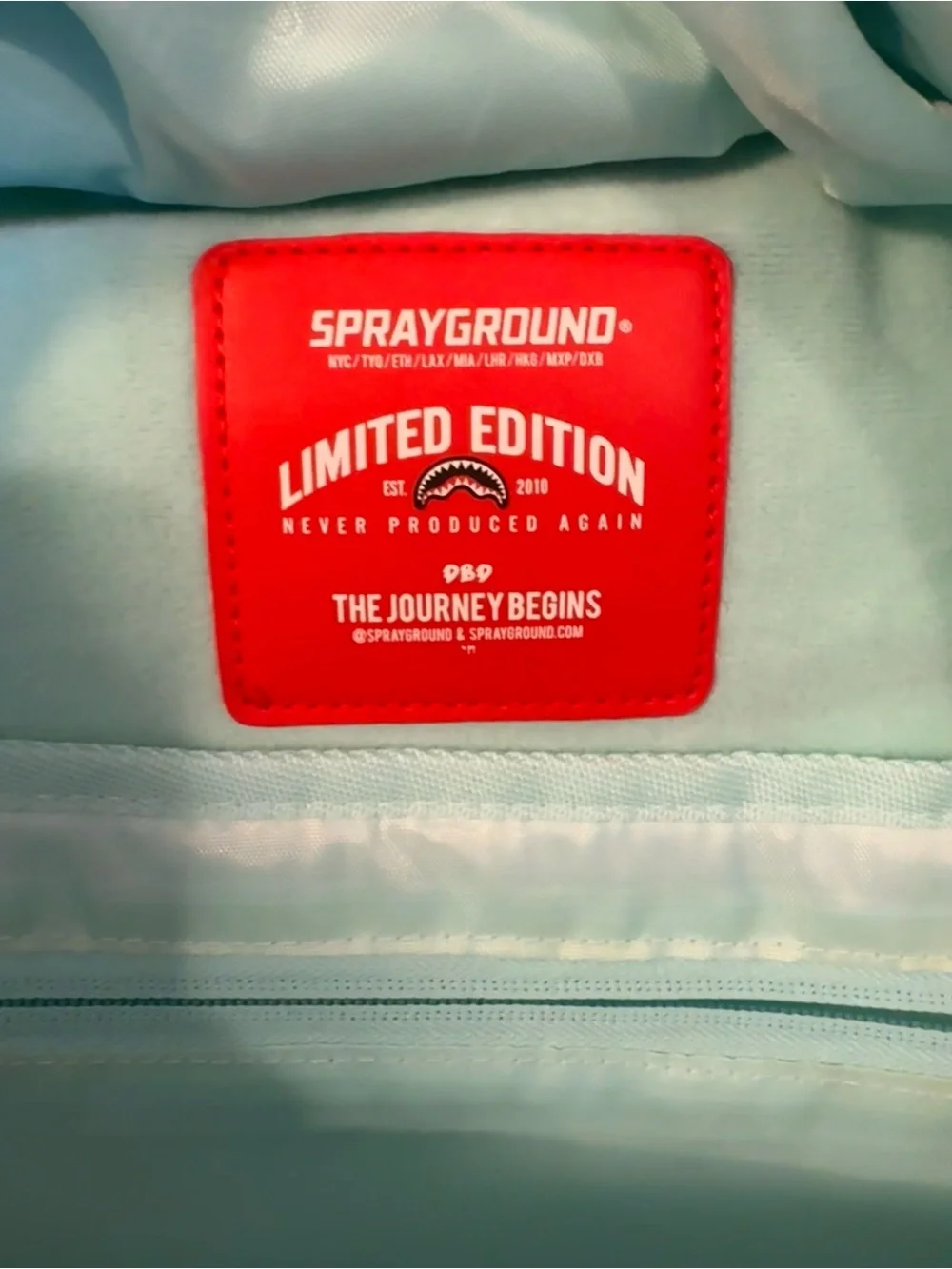 Sprayground White Backpack with Multicolor Planet Patches